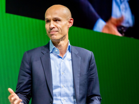 javier perez tasso in suite in front of green background